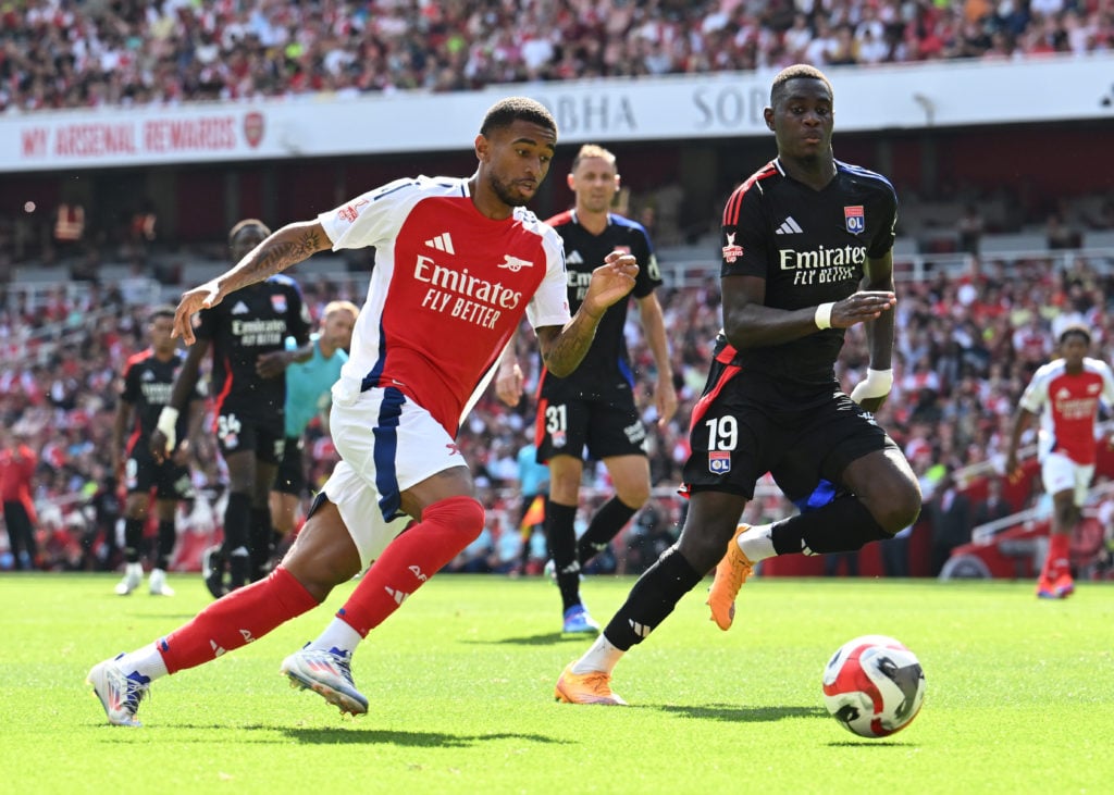 Reiss Nelson of Arsenal takes on Moussa Niakhate of Lyon during the pre season match between Arsenal and Olympique Lyonnais at Emirates Stadium on ...