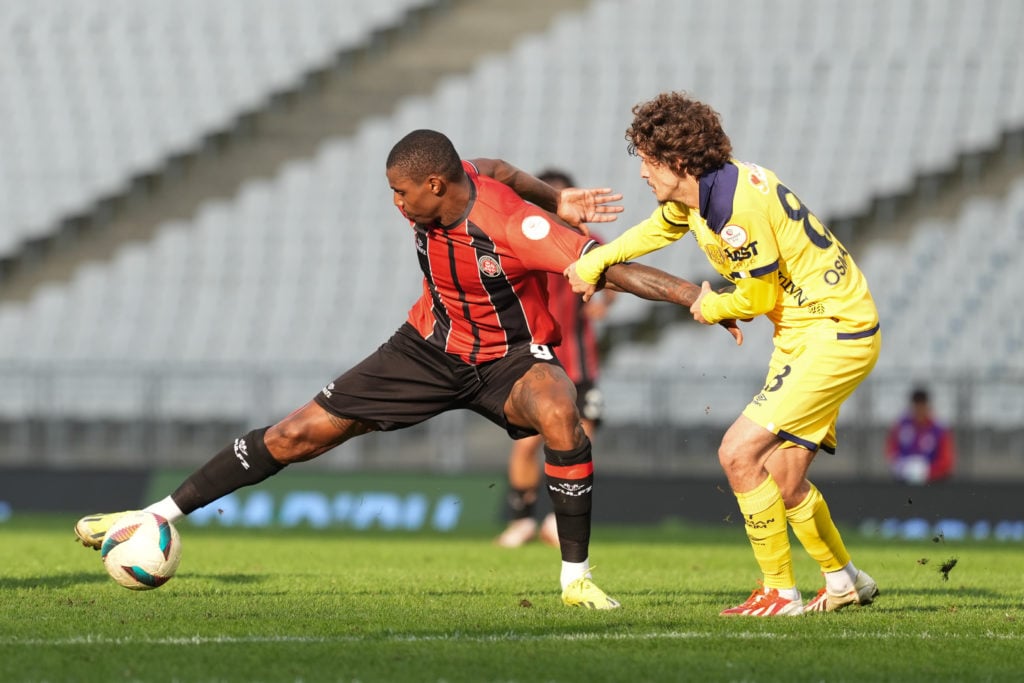 Wesley Moraes Ferreira of Fatih Karagumruk in action against Osman Celik of MKE Ankaragucu during the Turkish Football Federation 1st League footba...