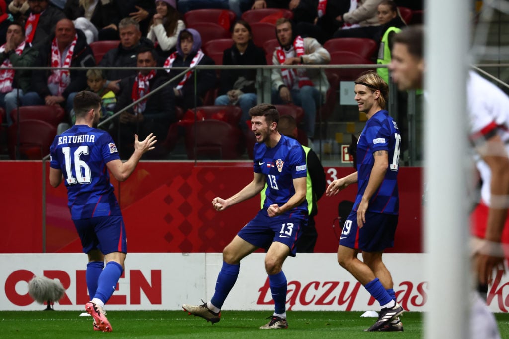 Martin Baturina and Petar Sucic of Croatia celebrate the goal during UEFA Nations League football match Poland - Croatia at National Stadium in War...