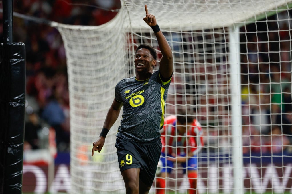 TOPSHOT - Lille's Canadian forward #09 Jonathan David celebrates scoring his team's third goal during the UEFA Champions League, league phase day 3...