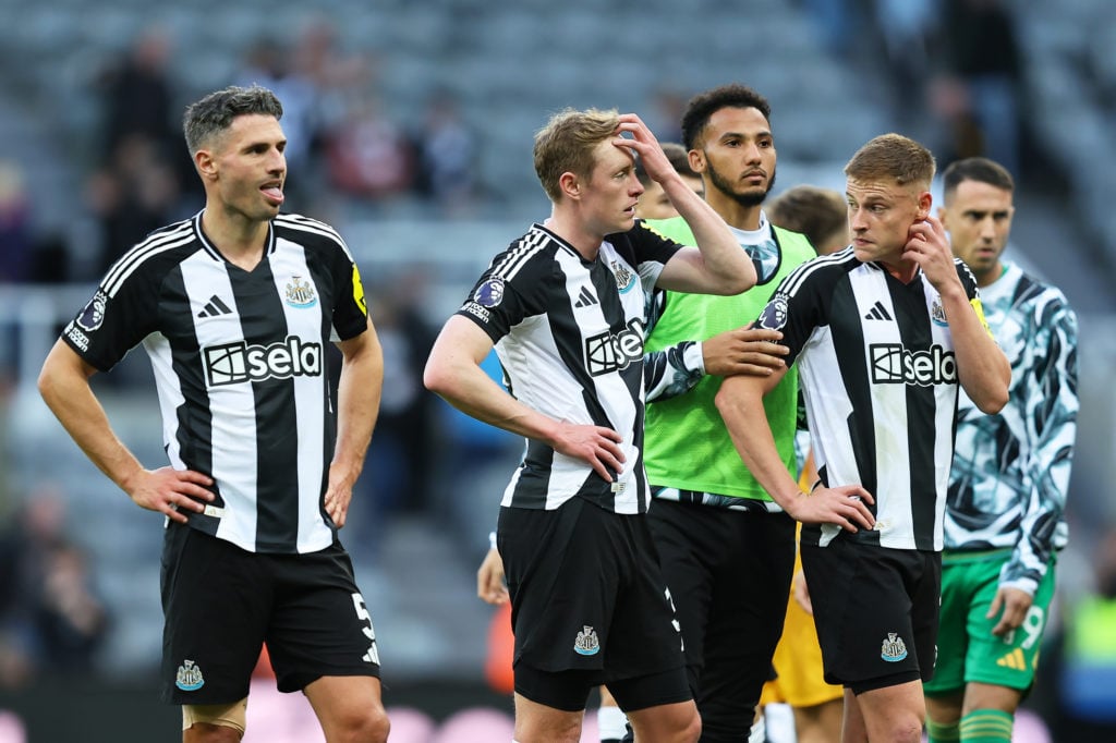 Sean Longstaff of Newcastle United looks dejected with teammates following defeat during the Premier League match between Newcastle United FC and B...