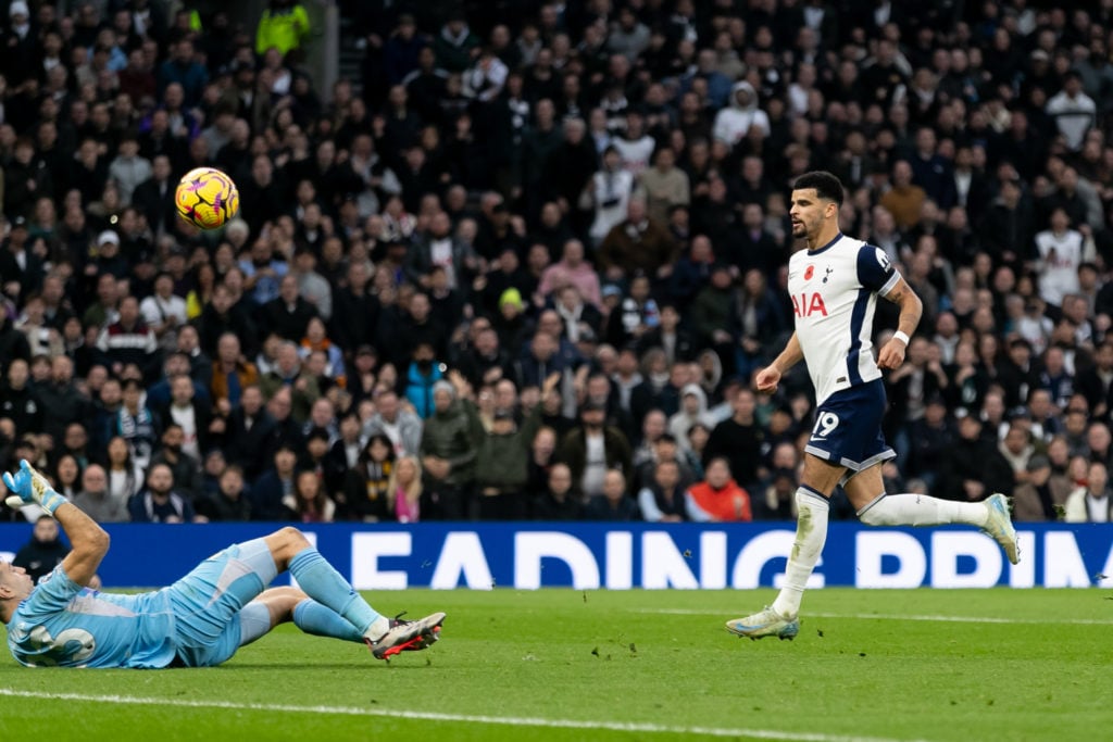 Dominic Solanke of Tottenham Hotspur shoots to score his team's second goal during the Premier League match between Tottenham Hotspur FC and Aston ...