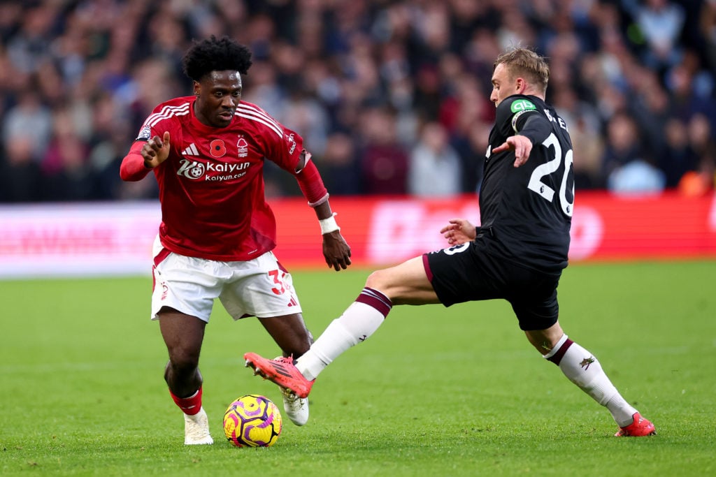 Ola Aina of Nottingham Forest is challenged by Jarrod Bowen of West Ham United during the Premier League match between Nottingham Forest FC and Wes...