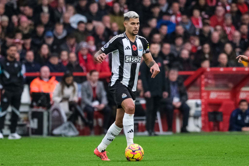 Bruno Guimarães of Newcastle United controls the ball during the Premier League match between Nottingham Forest FC and Newcastle United FC at City ...