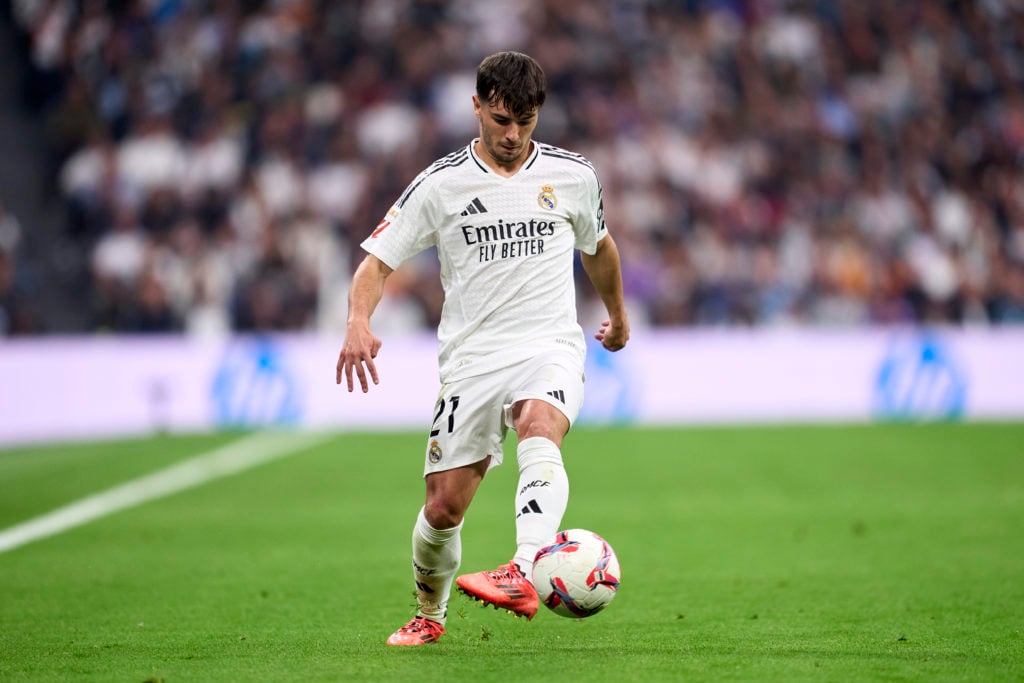 Brahim Diaz of Real Madrid plays the ball during the LaLiga EA Sports match between Real Madrid CF and CA Osasuna at Estadio Santiago Bernabeu on...