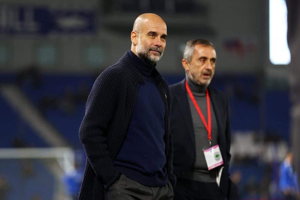 Pep Guardiola, Manager of Manchester City, looks on prior to the Premier League match between Brighton & Hove Albion FC and Manchester City FC ...