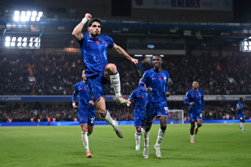 Pedro Neto of Chelsea celebrates scoring his team's first goal during the Premier League match between Chelsea FC and Arsenal FC at Stamford Bridge...