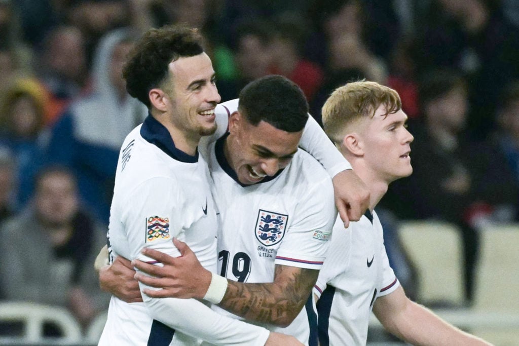 England's midfielder #17 Curtis Jones (C) celebrates with England's forward #19 Morgan Rogers (C) after scoring his team's third goal during the UE...