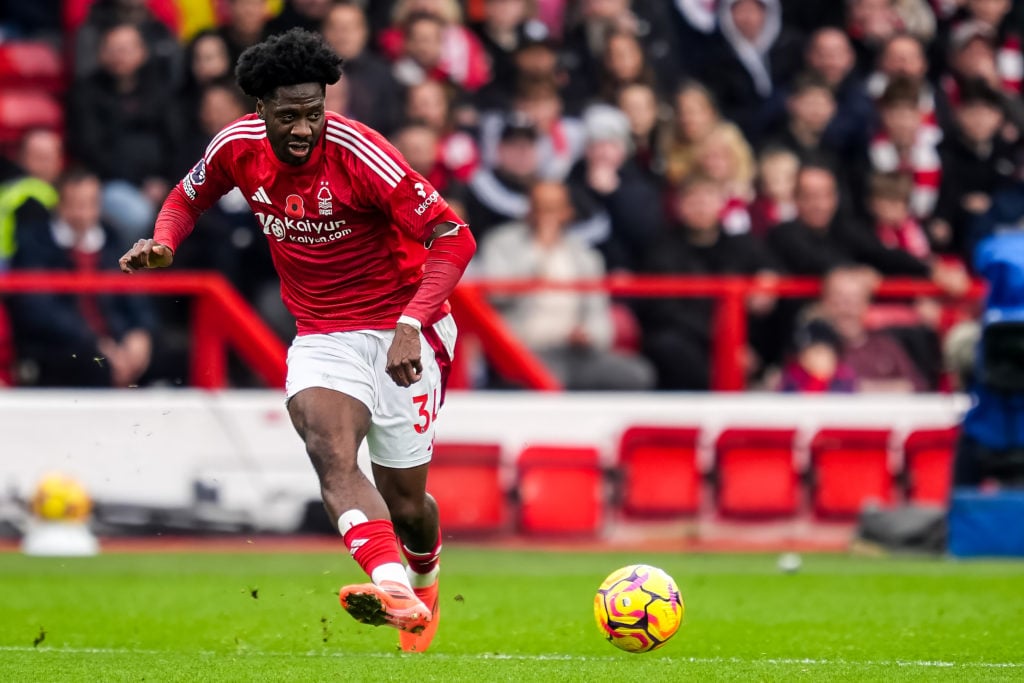 Ola Aina of Nottingham Forest FC passes the ball during the Premier League match between Nottingham Forest FC and Newcastle United FC at City Groun...