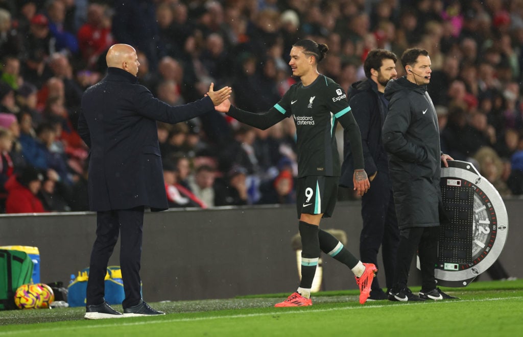 Darwin Nunez of Liverpool interacts with Arne Slot, Manager of Liverpool, during the Premier League match between Southampton FC and Liverpool FC a...