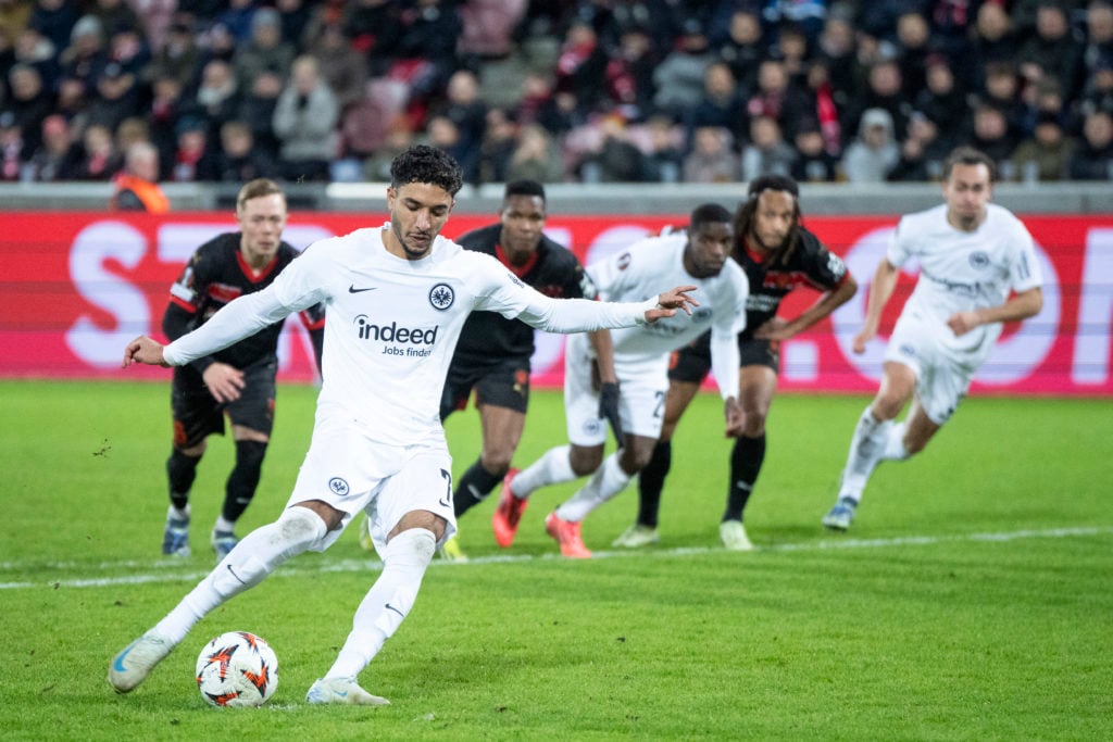 Frankfurt's Egyptian forward #07 Omar Marmoush shoots from the penalty spot and scores during the UEFA Europa League 1st round day 5 football match...