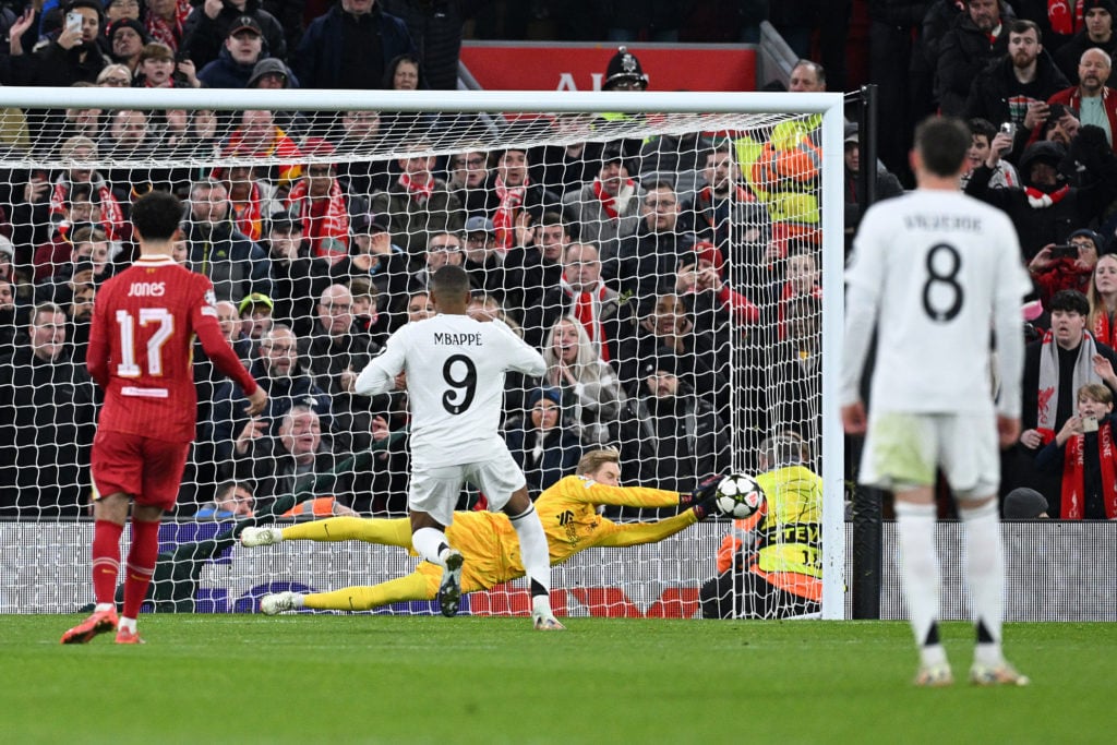 Caoimhin Kelleher of Liverpool saves a penalty from Kylian Mbappe of Real Madrid during the UEFA Champions League 2024/25 League Phase MD5 match be...