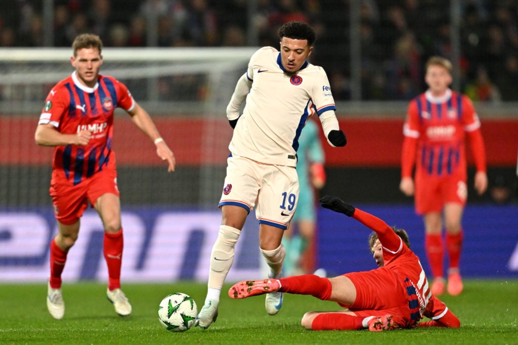 Paul Wanner of 1.FC Heidenheim 1846 attempts to tackle Jadon Sancho of Chelsea during the UEFA Conference League 2024/25 League Phase MD4 match bet...