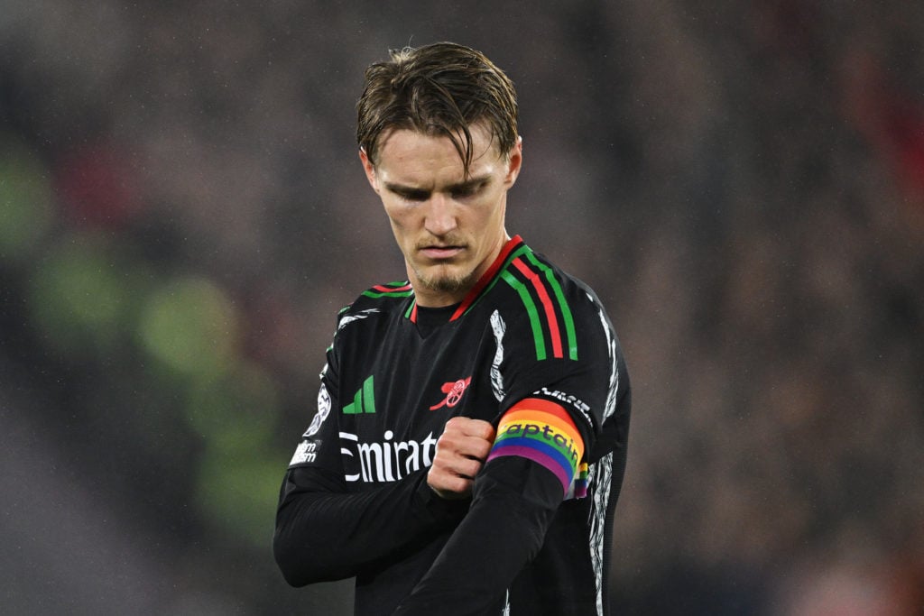 Martin Odegaard of Arsenal adjusts his rainbow coloured captains armband during the Premier League match between West Ham United FC and Arsenal FC ...