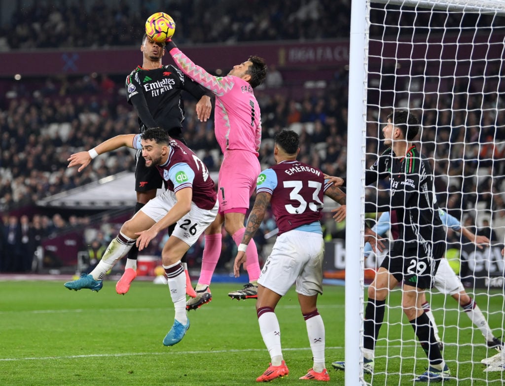 Gabriel of Arsenal is fouled by Lukasz Fabianski of West Ham United, which results in a penalty for Arsenal, during the Premier League match betwee...