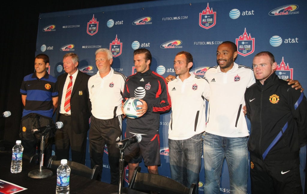 (L-R) Javier Hernandez and Sir Alex Ferguson of Manchester United, Hans Backe, David Beckham, Brad Davis and Thierry Henry of MLS AllStars and Wayn...