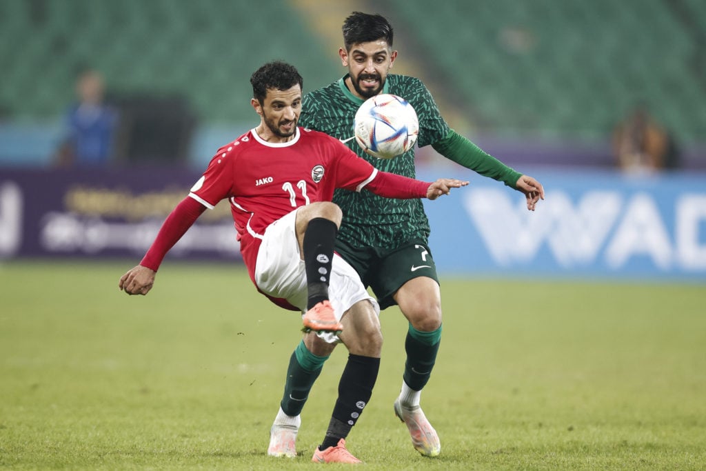 Abdulvasi el-Matari (11) of Yemen in action against Sumayhan Al-Nabit (7) of Saudi Arabia during the 25th Gulf Nations Cup match between Saudi Arab...