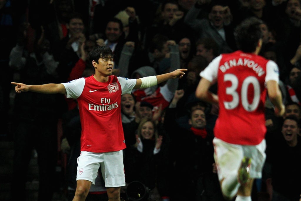 Park Chu-Young of Arsenal is congratulated by team mates after scoring his teams second goal of the game during the Carling Cup Fourth Round match ...