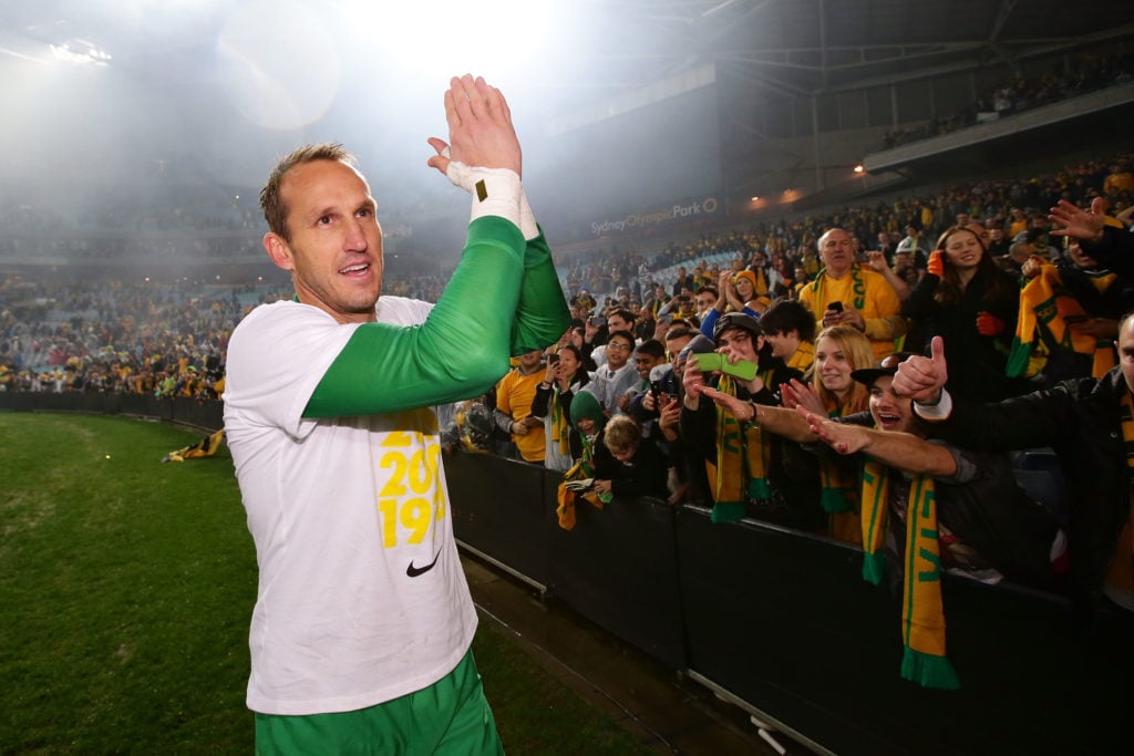 Mark Schwarzer of the Socceroos celebrates with fans after the FIFA 2014 World Cup Asian Qualifier match between the Australian Socceroos and Iraq ...