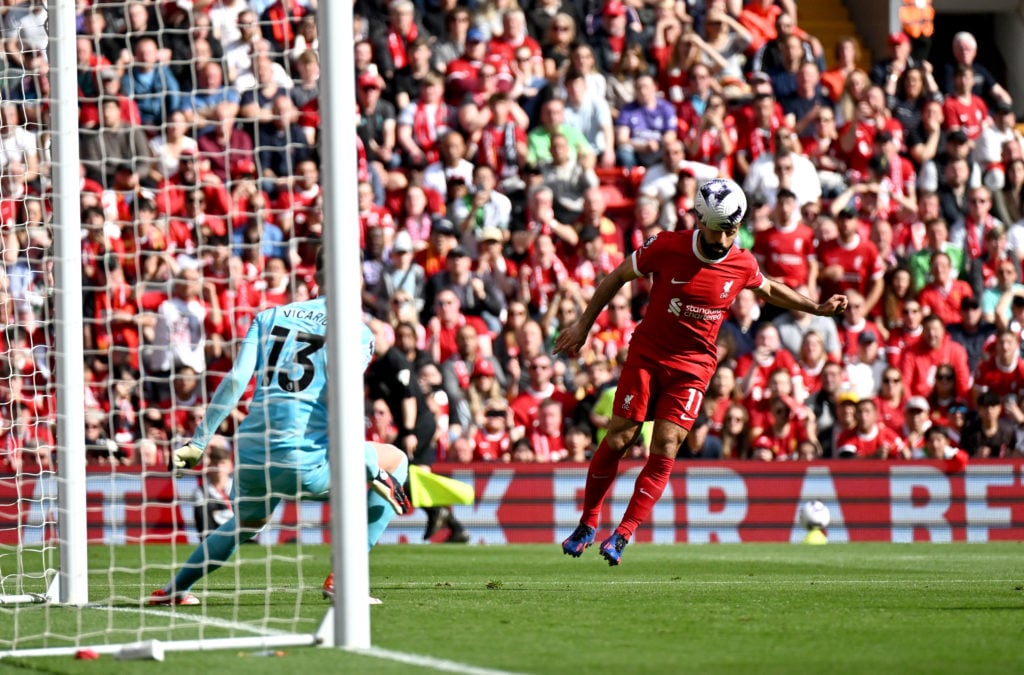 (THE SUN OUT, THE SUN ON SUNDAY OUT) Mohamed Salah of Liverpool scoring the opening goal during the Premier League match between Liverpool FC and T...