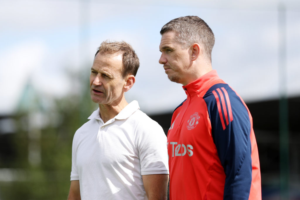 (EXCLUSIVE COVERAGE) Sporting Director Dan Ashworth speaks to Manager Marc Skinner of Manchester United Women during a training session at St Georg...