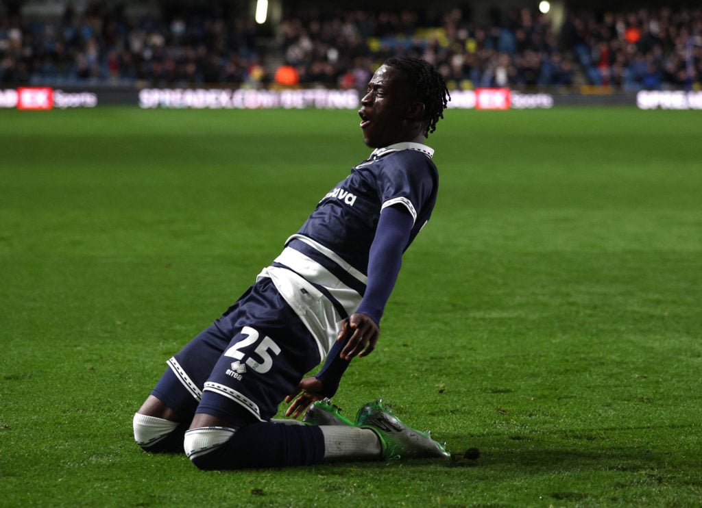 Romain Esse of Millwall celebrates scoring the first goal during the Sky Bet Championship match between Millwall FC and Plymouth Argyle FC at The D...