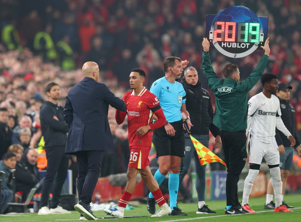 Trent Alexander-Arnold of Liverpool shakes hands with Arne Slot, Manager of Liverpool, after being substituted during the UEFA Champions League 202...