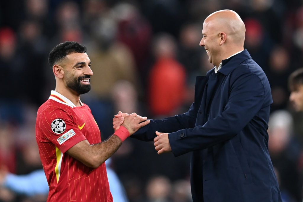 Liverpool manager Arne Slot celebrates with Liverpool's Mohamed Salah 
 during the UEFA Champions League 2024/25 League Phase MD5 match between Liv...