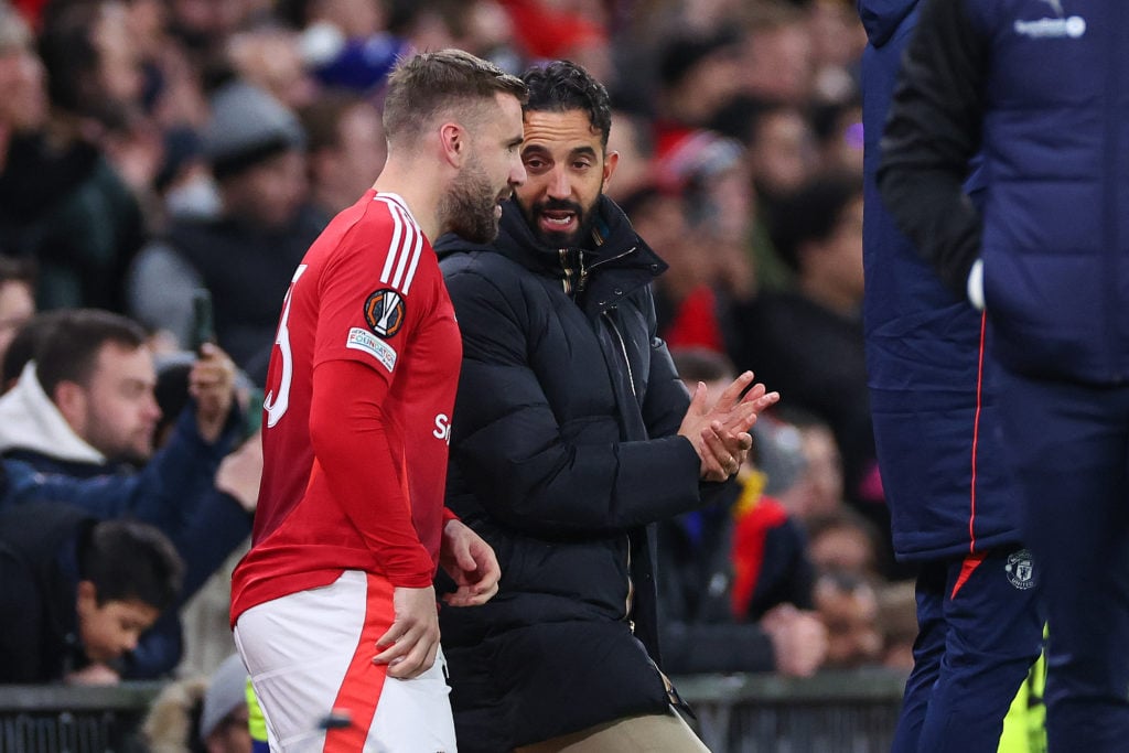 Luke Shaw receives instructions from Ruben Amorim the head coach / manager of Manchester United during the UEFA Europa League 2024/25 League Phase ...