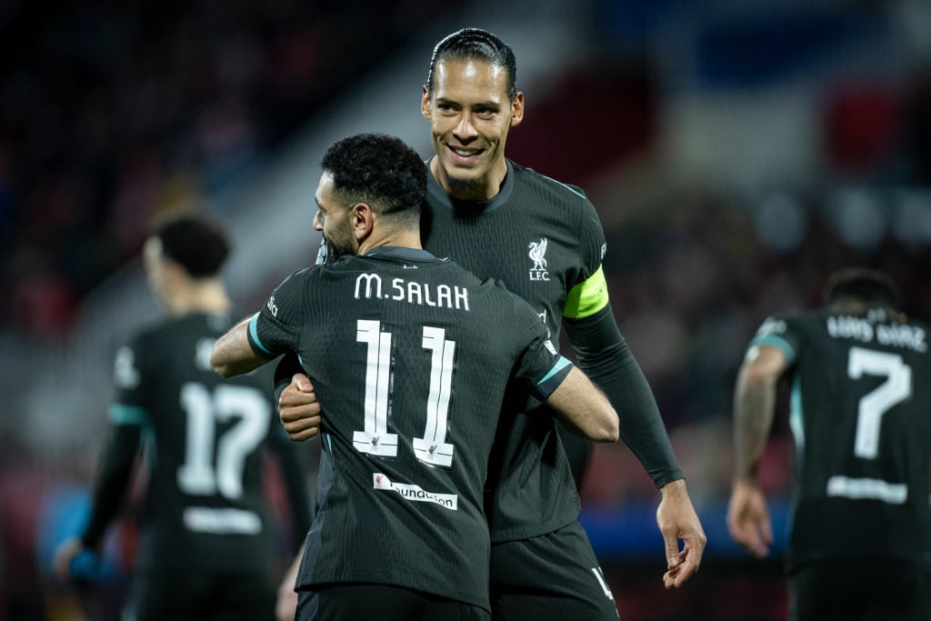 (L-R) Mohamed Salah (Liverpool FC) and Virgil Van Dijk (Liverpool FC) celebrate during a UEFA Champions League match between Girona FC and Liverpoo...