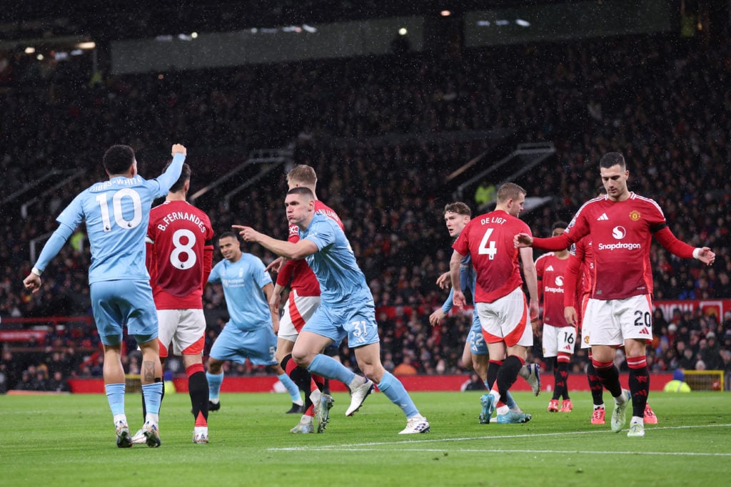 Nikola Milenkovic of Nottingham Forest celebrates after scoring the opening goal during the Premier League match between Manchester United FC and N...