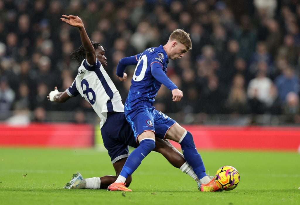 Yves Bissouma of Tottenham Hotspur tackles Cole Palmer of Chelsea  during the Premier League match between Tottenham Hotspur FC and Chelsea FC at T...