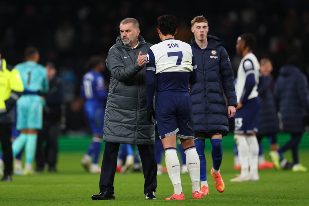 Ange Postecoglou manager / head coach of Tottenham Hotspur with a dejected Son Heung-Min after the Premier League match between Tottenham Hotspur F...