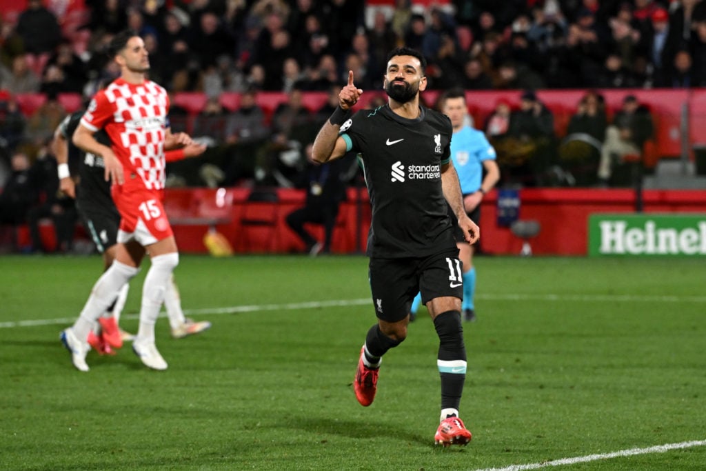 (THE SUN OUT, THE SUN ON SUNDAY OUT) Mohamed Salah of Liverpool celebrates scoring his team's first goal from the penalty spot during the UEFA Cham...