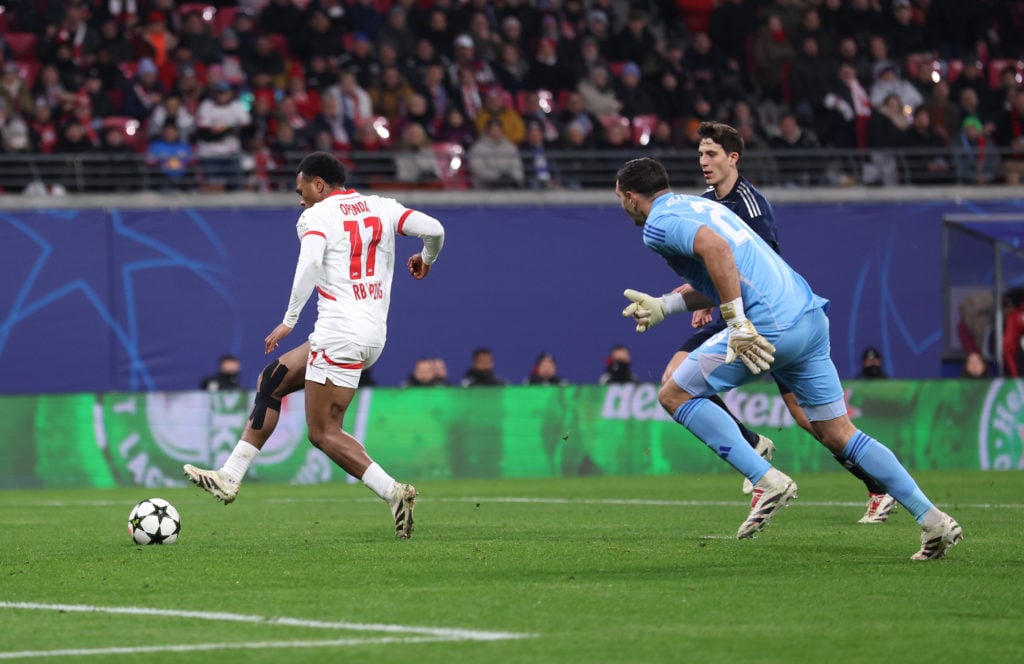 Lois Openda of RB Leipzig scores his team's first goal Emiliano Martinez of Aston Villa during the UEFA Champions League 2024/25 League Phase MD6 m...