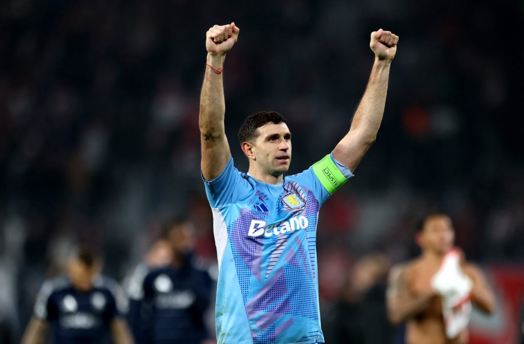 Emiliano Martinez of Aston Villa celebrates victory after the UEFA Champions League 2024/25 League Phase MD6 match between RB Leipzig and Aston Vil...