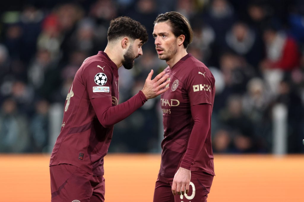 Josko Gvardiol of Manchester City interacts with teammate Jack Grealish during the UEFA Champions League 2024/25 League Phase MD6 match between Juv...