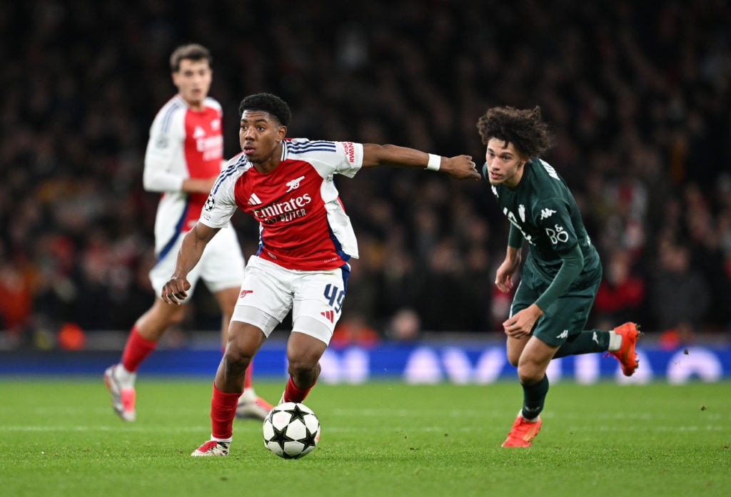 Myles Lewis-Skelly of Arsenal runs with the ball whilst under pressure from Maghnes Akliouche of AS Monaco during the UEFA Champions League 2024/25...