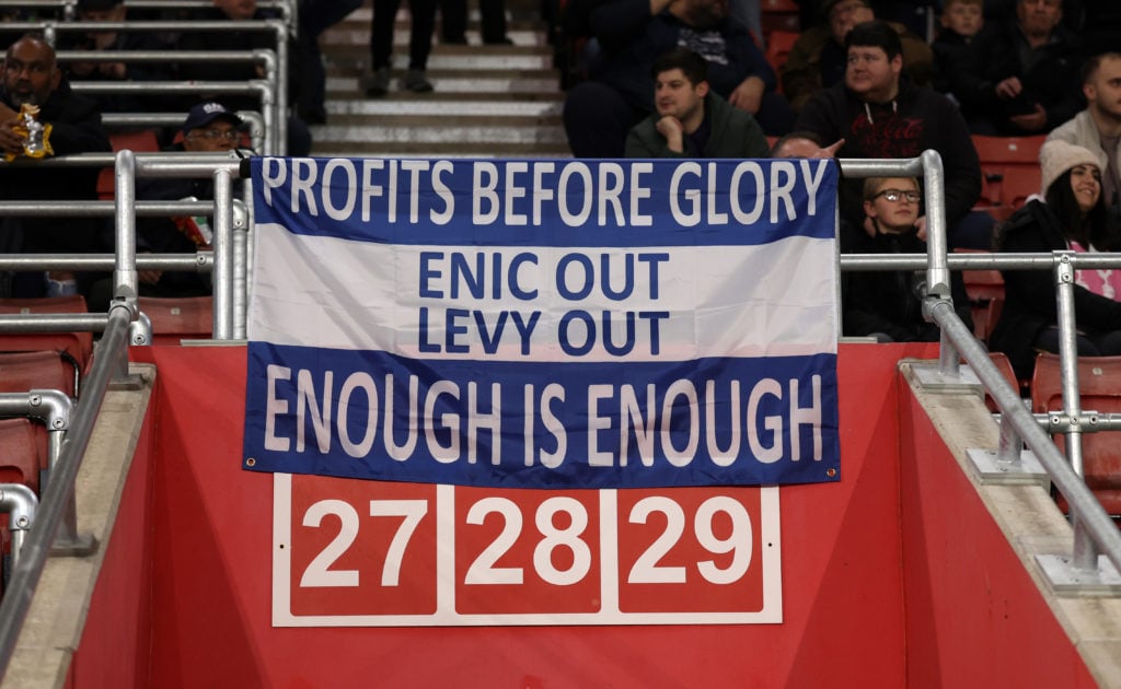 Tottenham Hotspur fans display a banner saying ' Levy Out  ENIC Out '  during the Premier League match between Southampton FC and Tottenham Hotspur...