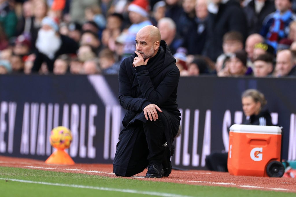 Manchester City manager Pep Guardiola looks dejected during the Premier League match between Aston Villa FC and Manchester City FC at Villa Park on...