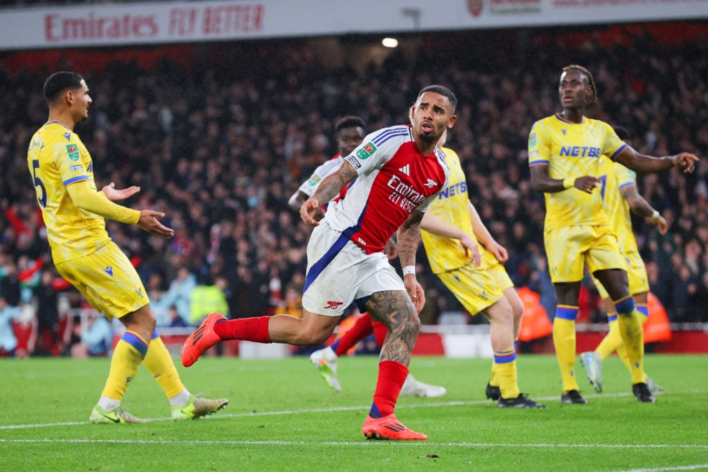 Gabriel Jesus of Arsenal runs away to celebrate after scoring their side's second goal during the Carabao Cup Quarter Final match between Arsenal a...