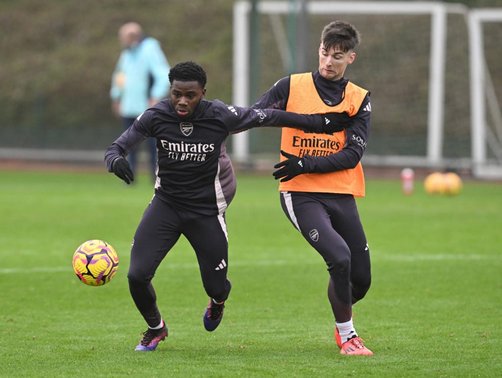 (L-R) Nathan Butler-Oyedeji and Kieran Tierney of Arsenal during a training session at Sobha Realty Training Centre on December 26, 2024 in London ...