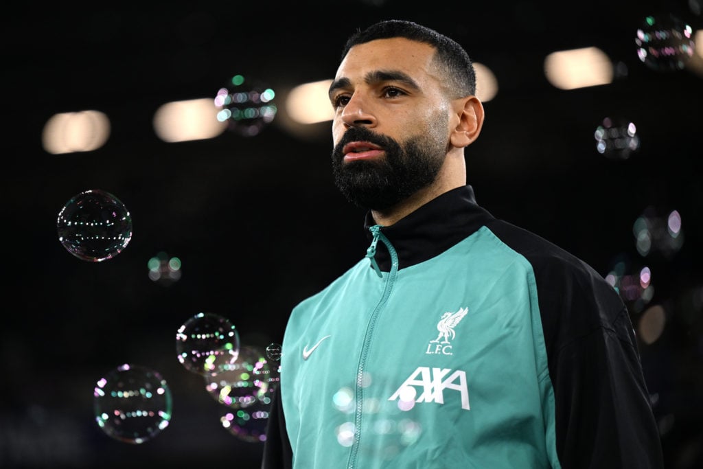 (SUN AND SUN ON SUNDAY OUT) Mohamed Salah of Liverpool makes his way out onto the pitch ahead of the Premier League match between West Ham United F...