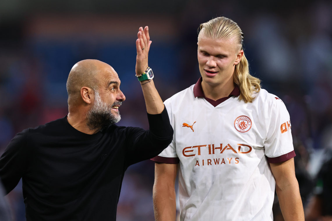 Pep Guardiola the head coach / manager of Manchester City reacts towards Erling Haaland of Manchester City during the Premier League match between ...