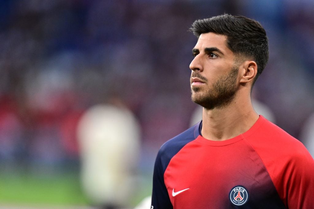 Paris Saint-Germain's Spanish Spanish Forward #11 Marco Asensio looks at when he warms up before the French L1 football match between Paris Saint-Germain (...