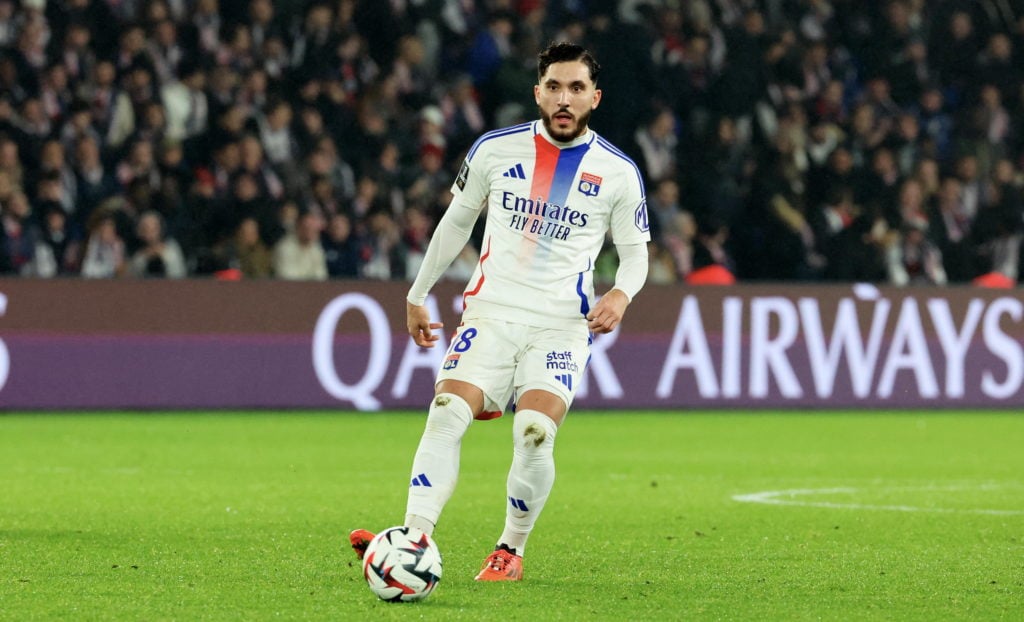 Lyon's Rayan Cherki on the ball against PSG