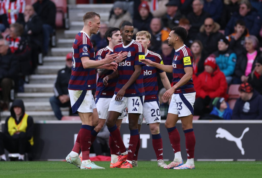 Alexander Isak of Newcastle United celebrates scoring his team's second goal with teammates during the Premier League match between Southampton FC ...