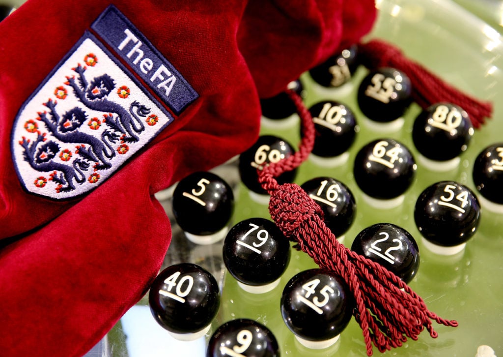 A general view of the balls being prepared for the FA Cup First Round Draw at St Georges Park on October 27, 2014 in Burton-upon-Trent, England.