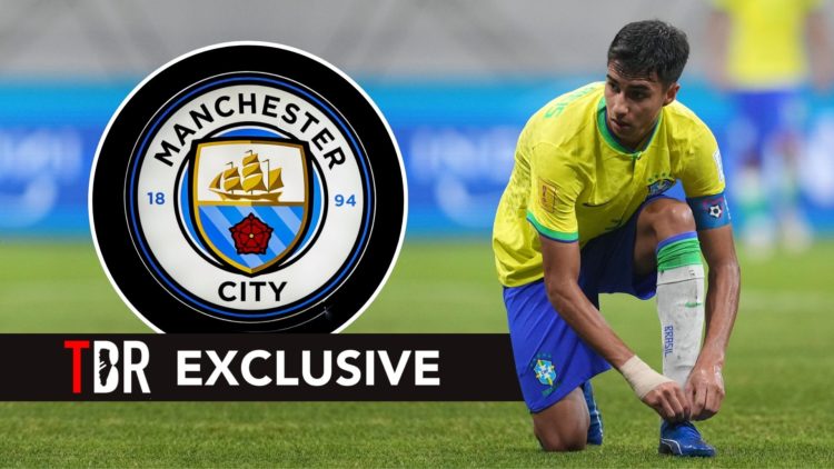 Vitor Reis with Manchester City badge