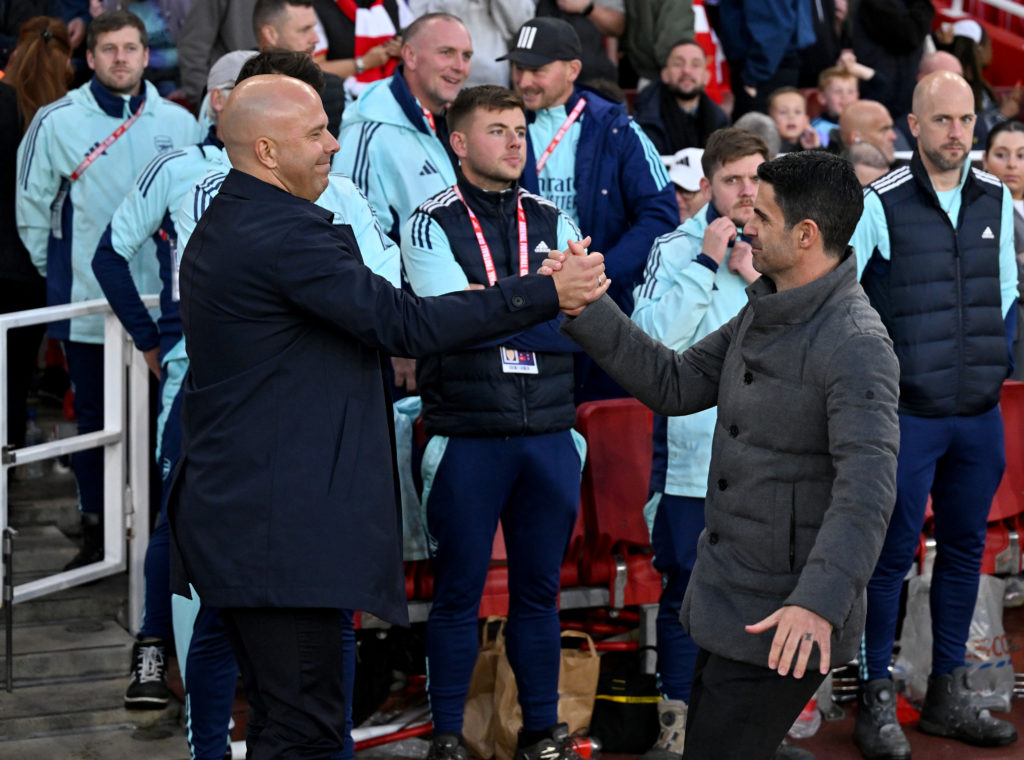 Arne Slot and Mikel Arteta shake hands before a game between Arsenal and Liverpool